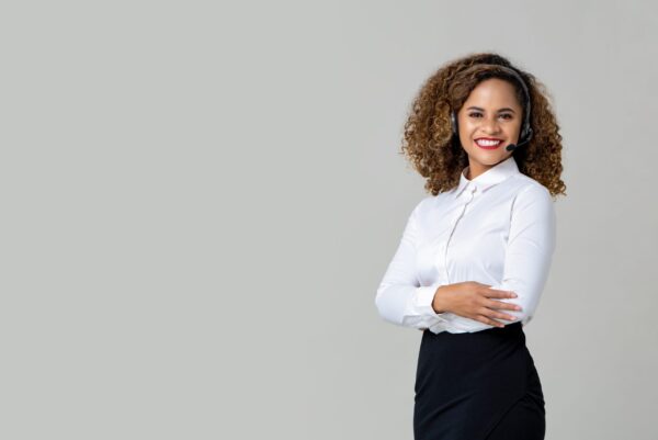 Smiling,Arms,Crossed,African,American,Woman,Wearing,Microphone,Headset,As