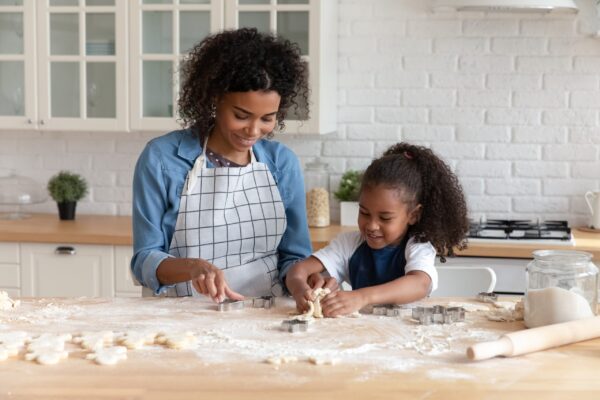 Happy,African,American,Mom,Helping,Cute,Daughter,To,Bake,Biscuit,